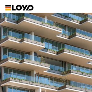 Modern high-rise building facade by ELOYD featuring multiple floors with glass balconies adorned with lush green plants.