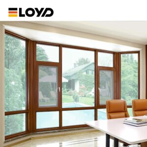 LOYD dark woodgrain casement windows with screens opening to a garden and pool view, in a bright room with a white desk and leather chairs.